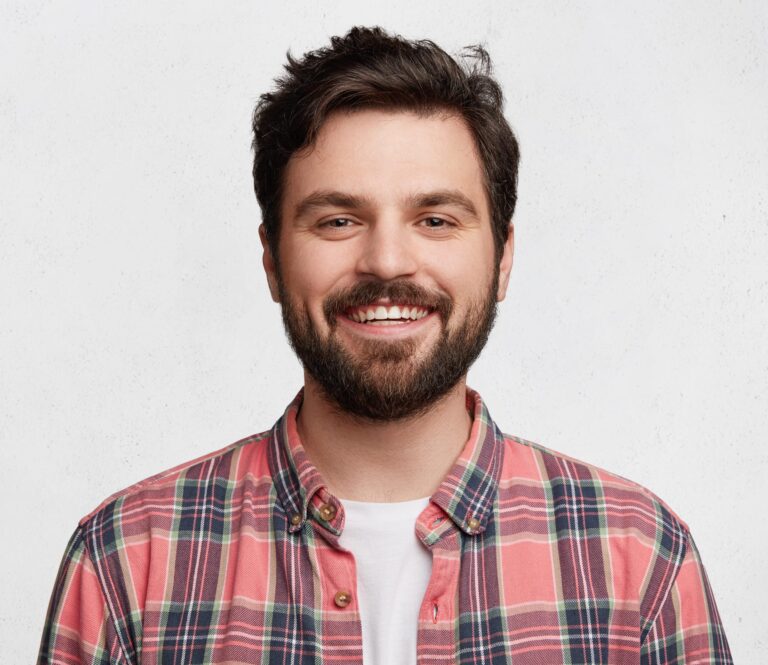 young-bearded-man-with-striped-shirt-min-e1704743632714-scaled